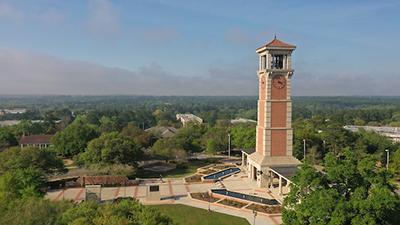 Aerial view of campus displaying Bell Tower.